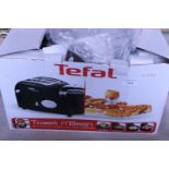 A new boxed Tefal 'Toast & Bean'.