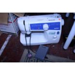 A Brother JS23 electric sewing machine with foot pedal. untested. Postage unavailable