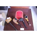 A selection of vintage smoking pipes & a Dunhill record