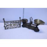 A set of vintage scales & weights & a brass trivet