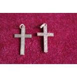 Two 9ct gold cross pendants. 1.31 grams total