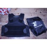 A stab vest and protective pads