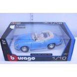 A boxed Burago die-cast model of a Porsche scale 1/18