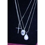 Three silver necklaces with pendants