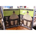 Two boxed sealed inflatable sumo suits