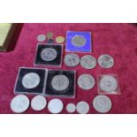 A selection of collectable commemorative coins etc