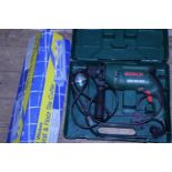 A Bosch electric drill and tile cutter (untested), shipping unavailable