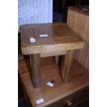 A small heavy oak stool. Shipping unavailable