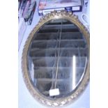 A vintage bevelled edge gilt framed mirror. Shipping unavailable