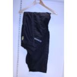 A pair of Shoei motorbike trousers size L