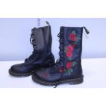 A pair of new Dr Martens lace up boots with embroidered decoration size 7
