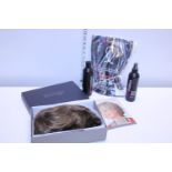 A boxed ladies wig and accessories