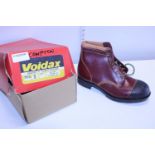 A new pair of men's safety boots size 9