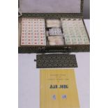 A new boxed and sealed Mah-jong set