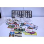 A large job lot of assorted collectors cards etc