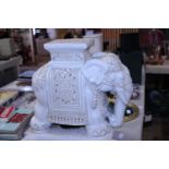 A large ceramic elephant planter stand. Shipping unavailable