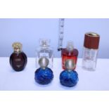 A selection of assorted empty perfume bottles
