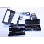 A Curaprox black is white hydrosonic toothbrush set