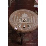 A Anglo-Indian style inlaid table. Shipping unavailable.