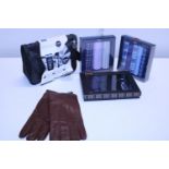 A selection of new items including leather gloves, headkerchiefs and cosmetics