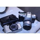 A Pentax MZ50 camera and a Konika camera (untested)