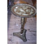 A wooden wine table with elaborate decoration. Shipping unavailable