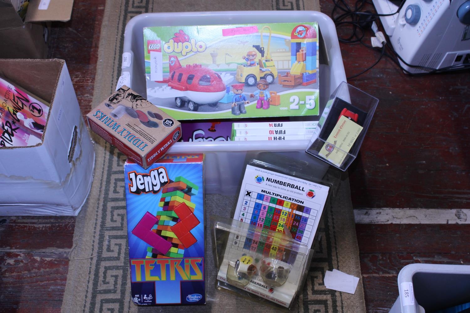 A box of assorted vintage games etc