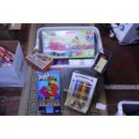 A box of assorted vintage games etc