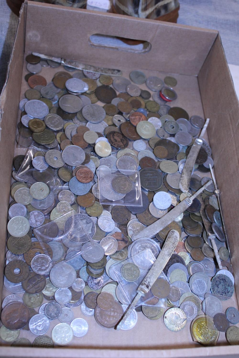 A large collection of assorted world coins