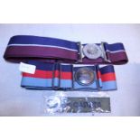A selection of military style belts and other