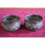 Two Indian silver elaborately decorated pots