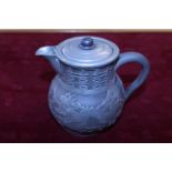 A antique Chinese pewter jug (damage to inside of lid)