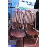Four mid-century Ercol dining chairs. Shipping unavailable