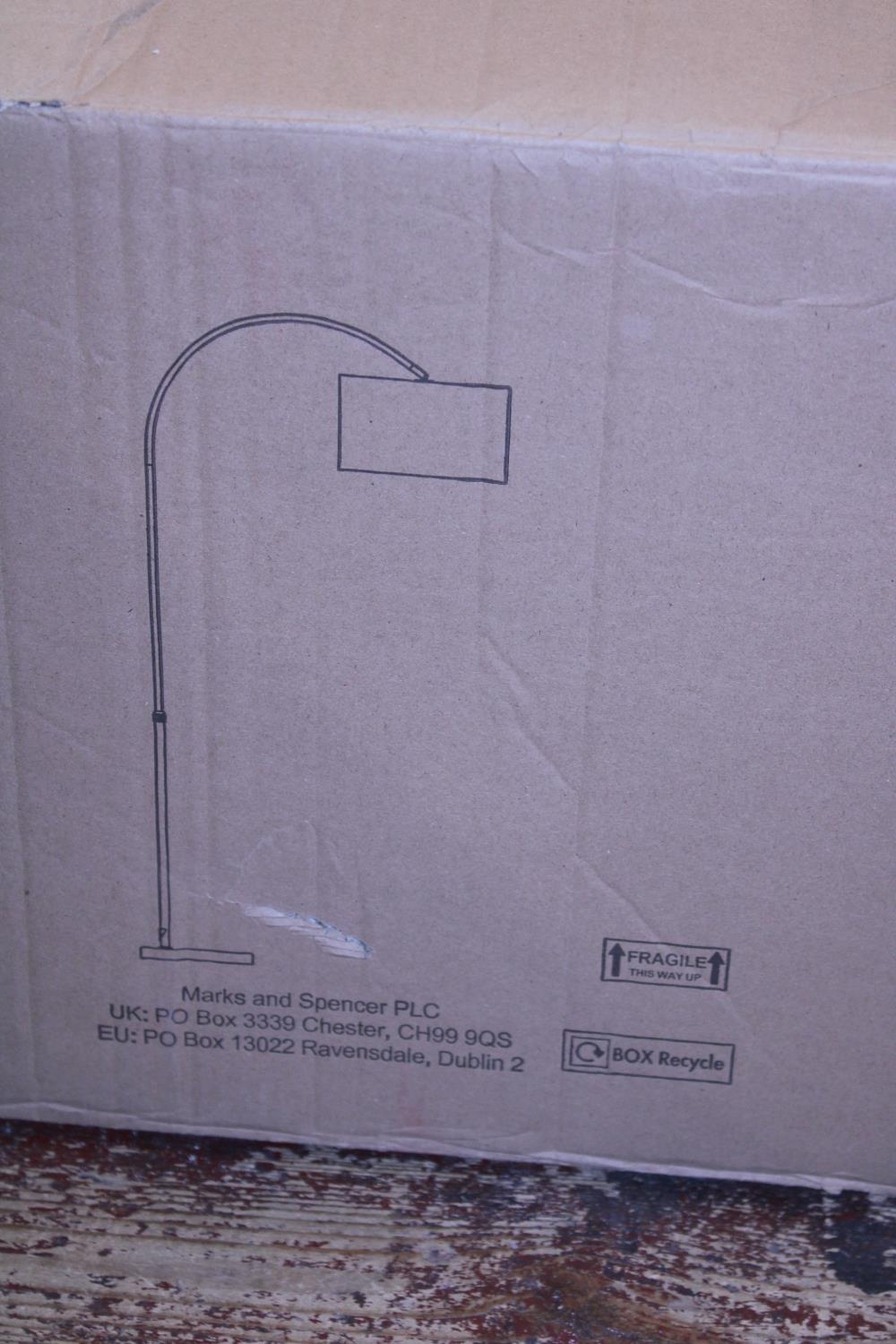 A Marks and Spencer's Floor standing lamp (unchecked). Shipping unavailable