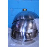 Five stainless steel tureen covers