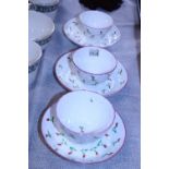 Three hand decorated 19th century tea bowls and saucers