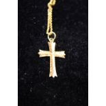 A 22ct cross and chain 5.43g