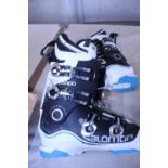 A pair of Salomon ski boots. Shipping unavailable