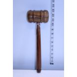 A large wooden gavel