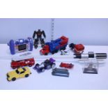 A selection of assorted die-cast models and other including transformers