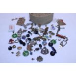A job lot of assorted pin badges etc including military