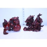 Two heavy resin Oriental figures