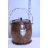 A vintage oak ice bucket with original liner