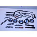A job lot of assorted BMW badges and other