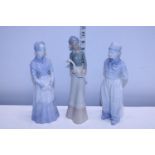 Three assorted ceramic figurines