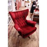 A vintage red velvet wing back swivel chair (possibly G Plan Sixty Two), a/f shipping unavailable