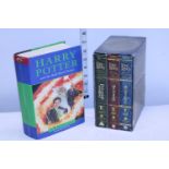 A first edition Harry Potter and a Lord of the Rings DVD box set
