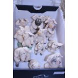 A box of assorted Piggin's figures