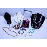 A selection of vintage costume jewellery with good quality stone and some with silver clasps