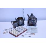 A vintage self pouring tea set and selection of flat ware